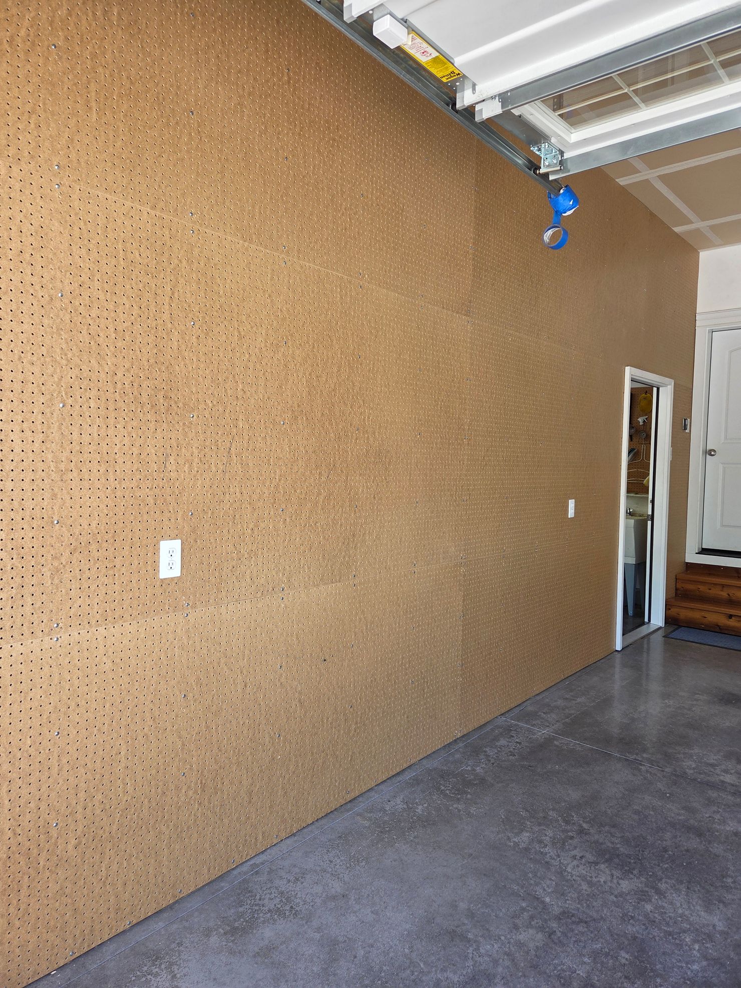 Pegboard partition wall.