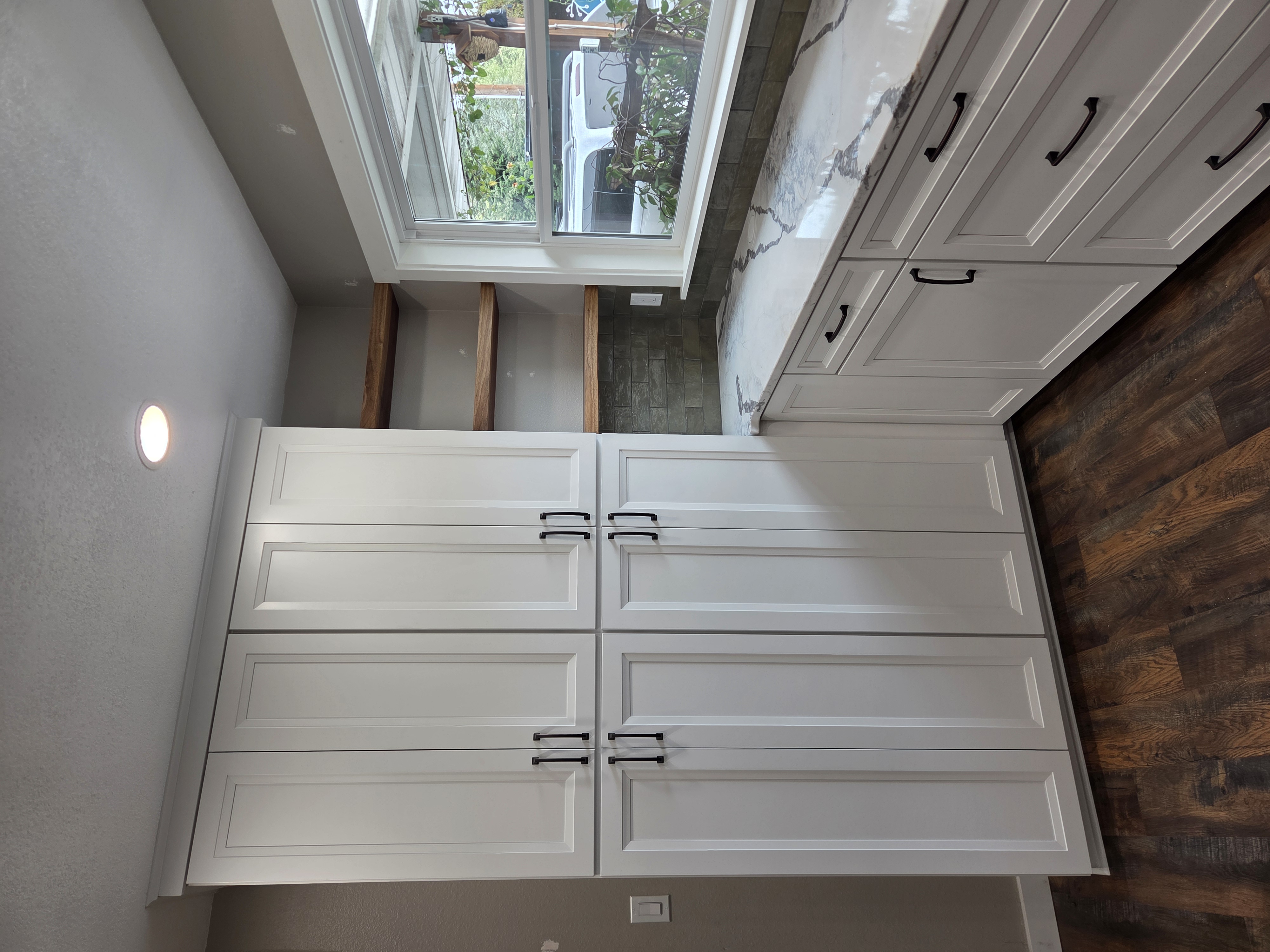 New pantry cabinets and floating shelves