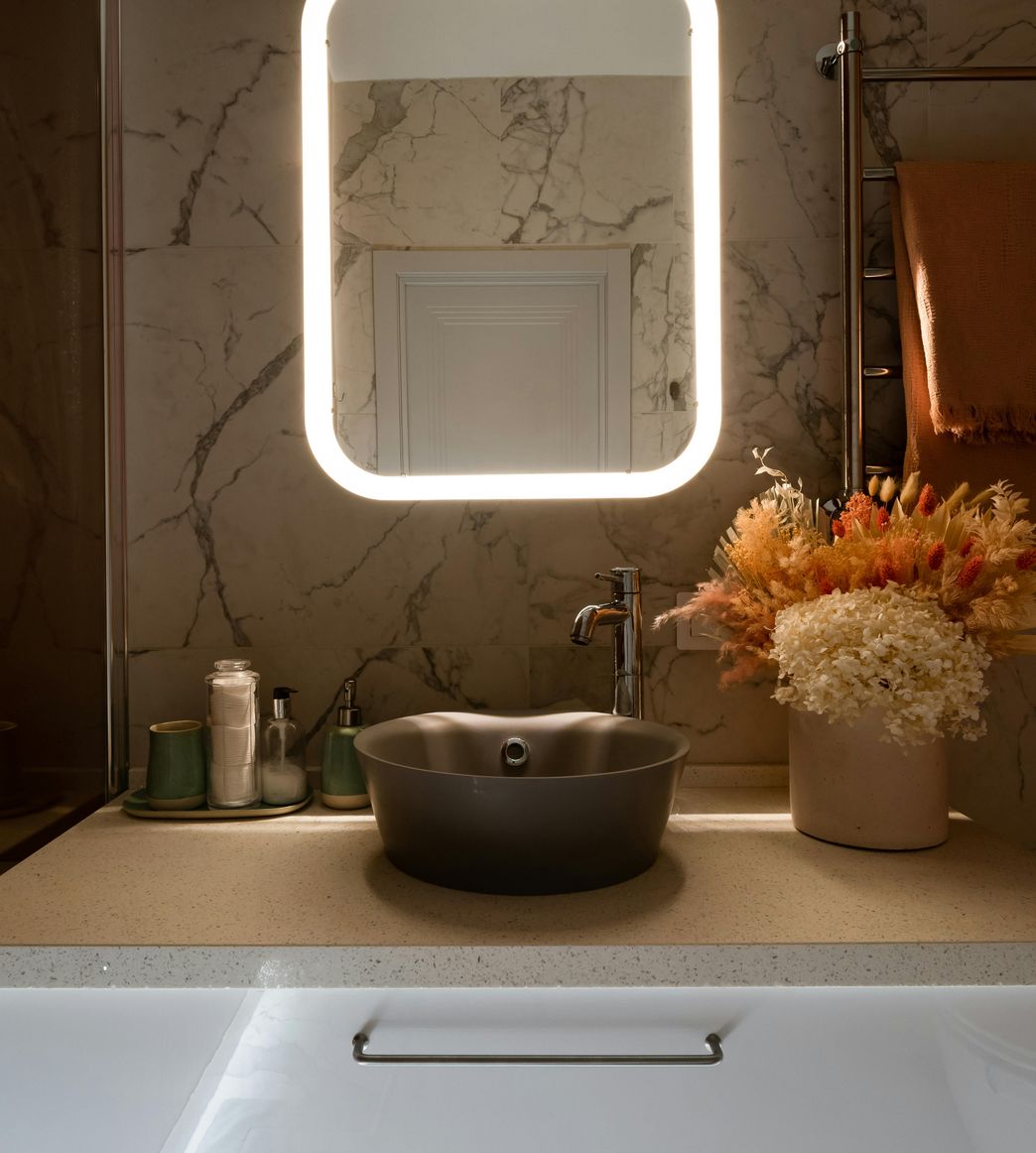 modern bathroom with backlit mirror